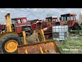 Tractor junk yard and a nice 860 Massey combine