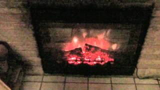 My new Dimplex purefire fireplace insert running. This fireplace insert is electric and has a 1500 watt thermostatically controlled 