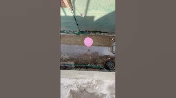 Will a water balloon explode if it rolls down from a tall building #satisfying #balloon