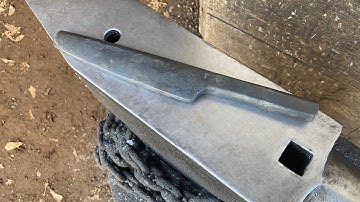 Forging an axe eye drift by hand