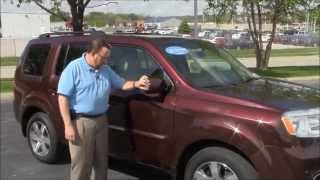 Used 2013 Honda Pilot Touring 4WD for sale at Honda Cars of Bellevue...an Omaha Honda Dealer!