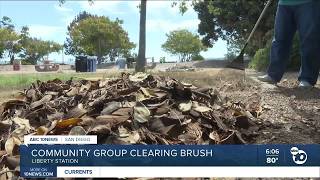 More than 100 volunteers clear brush at NTC Park to reduce wildfire risk in San Diego