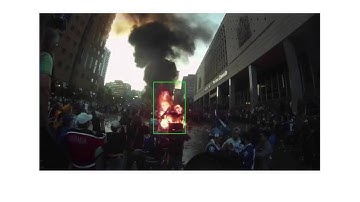 Fire Detection in Videos of Violent Crowds Acquired with Handheld Devices