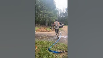 Clearing Blocked Culvert Drain With Tire - Satisfying!