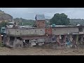 Terrifying Moment Buildings CRASH Into River During Deadly India Floods