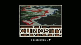 DLC: The Curiosity Company (backwards variant, 2023)/Warner Bros. Television (2003)