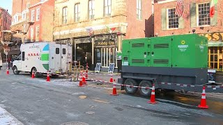 Repair work following manhole fires impacting Boston businesses