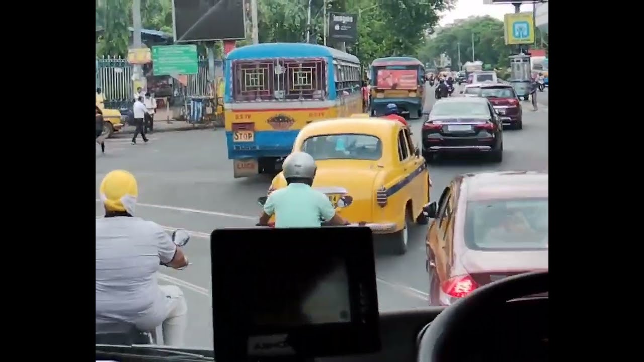 Janbus of WBTC ride on a busy street of kolkata