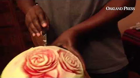 Master fruit carving artisan Cary Thornton at work...