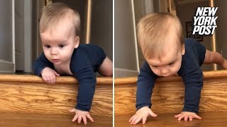 Hold your breath while this baby crawls face-first down the stairs