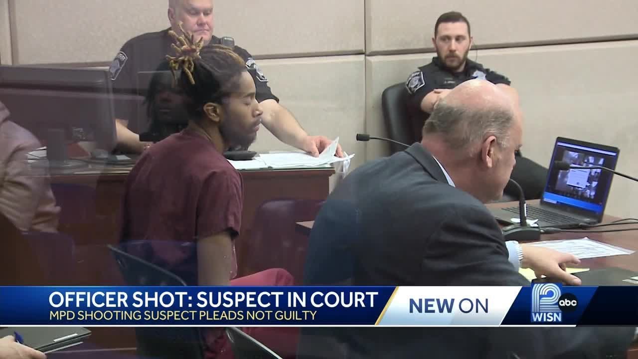 Man charged with shooting Milwaukee police officer pleads not guilty ...