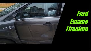 Ford Escape Front Door Lock Replacement Procedure