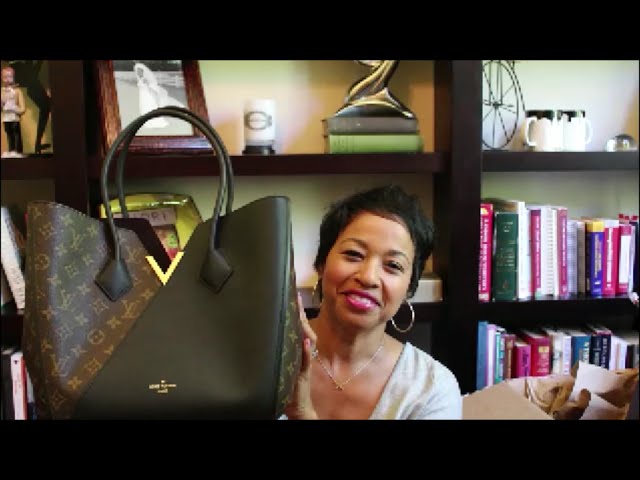 Louis Vuitton Monogram Kimono Handbag. This sophisticated handbag is
