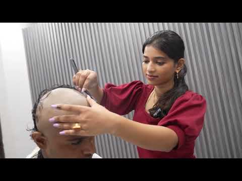 A BOY HEAD SHAVE BY MISS BARBER