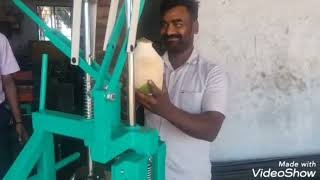 SEMIAUTOMATIC TENDER COCONUT PEELING MACHINE
