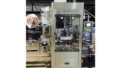 Automatic tape shrink wrap machine