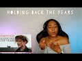 Simply red  holding back the years reaction