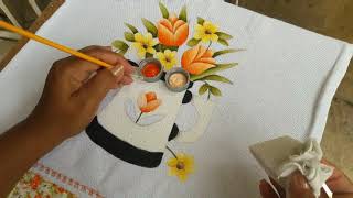 Pintura bule com flores no pano de copa parte final.