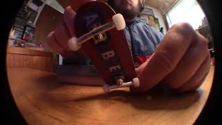 fingerboarding on a granite ledge