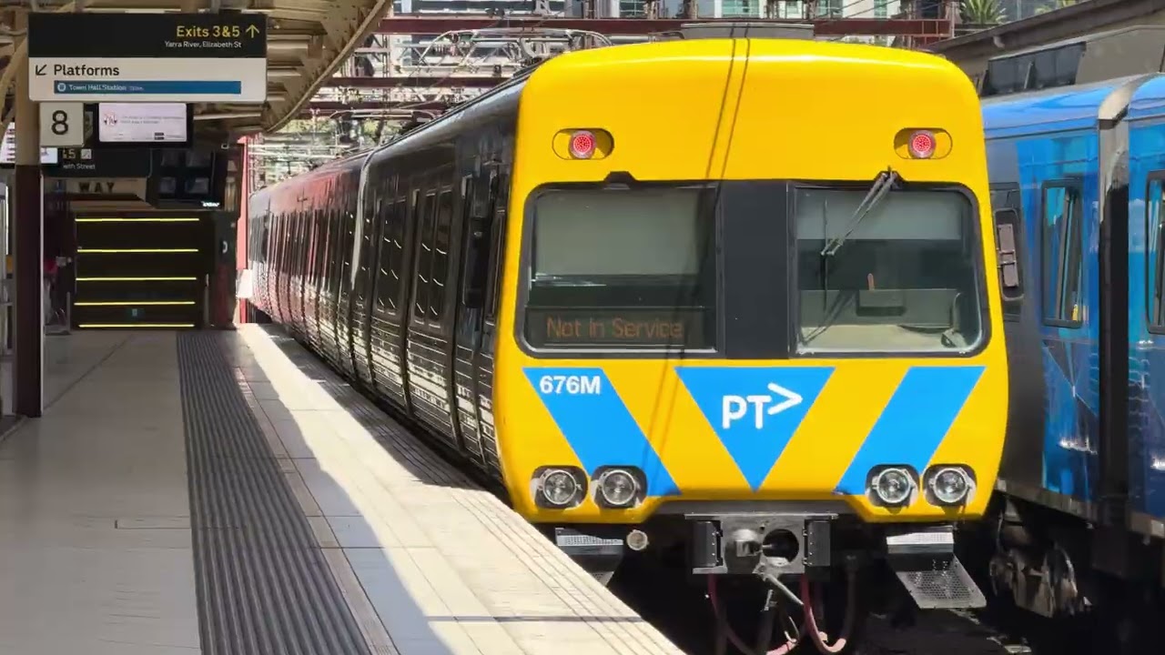 Comeng empty cars departing Flinders Street