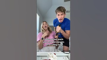 He Grabbed A Curling Iron!