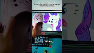 A Person Is Playing With The Ponies.