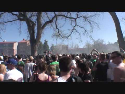apparently 10000+ people showed up this year, good times Rocky Mountain News - It was a warmer-than-average, sunny day in Boulder on Sunday. And around 4:20 pm on the University of Colorado campus, the sky grew unusually hazy. Cheers erupted along with a heavy cloud of smoke as an estimated 10000 people - mostly CU students joined by friends from out of town and some local residents - lit up to celebrate at an annual pot-smoking rally. Some said they were there to advocate for the legalization of marijuana. Others - including some who came just to watch - said it was all for fun. "It's like, why do people drink beer on St. Patrick's Day?" said a 22-year-old "super senior" who didn't want to give his name. "It's a holiday. Like the Fourth of July." The number 420 is slang for marijuana. Across the country each year, pro-pot rallies are held on April 20 or 4/20. Though there were events all day long on the CU campus, from an art display to live bands, the students chose 4:20 pm for the massive smoke-up at Norlin Quadrangle. A few guys played drums. Some girls danced. Beach balls and Frisbees flew through the air. CU police monitored the gathering, with 15 campus officers and six Boulder County sheriff's deputies stationed around the perimeter and directing traffic. According to a news release, the focus was to "maintain a safe environment and discourage potentially hazardous activities." No citations were issued and there were no arrests, although there were four medical <b>...</b>