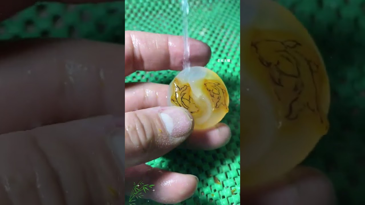 The leftover bracelet core from making a bracelet is carved into a double fish pendant sym