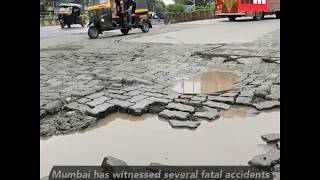 Watch: Mahim residents take to filling potholes near Bandra