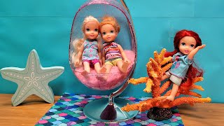 Ariel's fish tank ! Elsa & Anna toddlers  mermaid tails fun