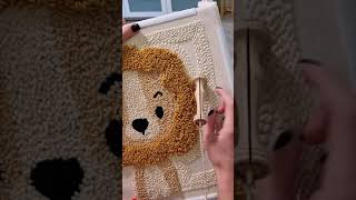 : lion punch needle pillow