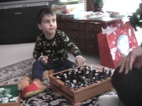 Alexander is teaching Dad how to play chess - Dec 2003