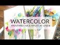 watercolor painting in an assembly line - covers of Traveler's Notebooks