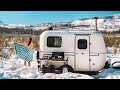 CAN WE GET OUT? // Post BLIZZARD SHOWER + SOLAR UPGRADE // Off-Grid 13ft Scamp Trailer