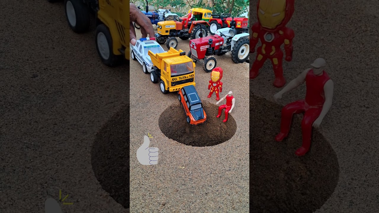 DZ Tipper Truck and polis car pushing cars and mini truck in to pit near tractors 