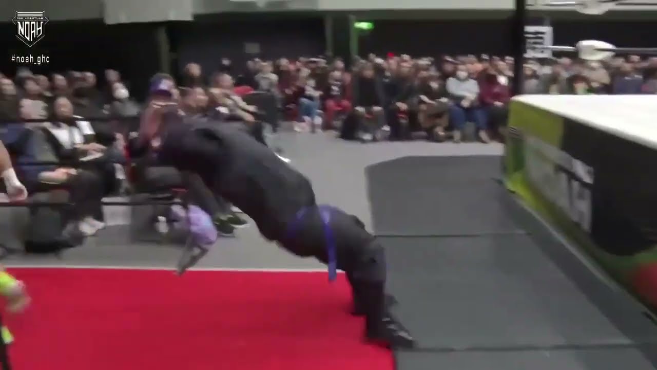 Wrestling Advent Calendar: Ninja Mack chases after a fleeing Hiromu with multiple backflips