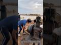 Starting an old engine: person starting an old engine