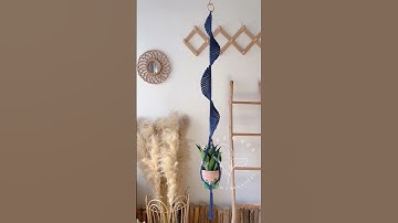 Crafting beauty one knot at a time! my labor of love: spiral macrame plant hanger in sleek cool blue
