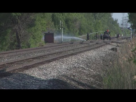 First responders combat brush fires along local train tracks - YouTube