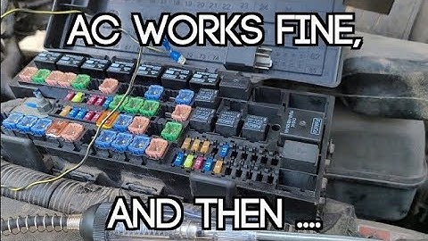 AC works fine when driving, but stops blowing cold when stopped. It