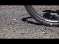 Jones gravel road plus bike with 6062229x235 tires on wide rims in slow motion