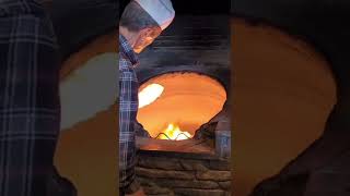 Lebanon Levantine bread baked taboon tannur clay oven, خبز الطابون خبر التنور الخبز اللبناني اللفة