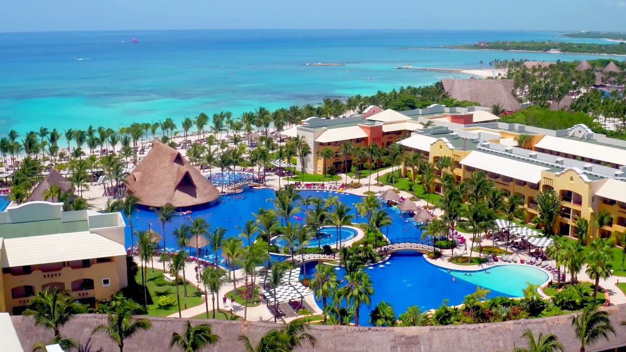 beautiful tropical beach resort hotel pool by aerial - YouTube