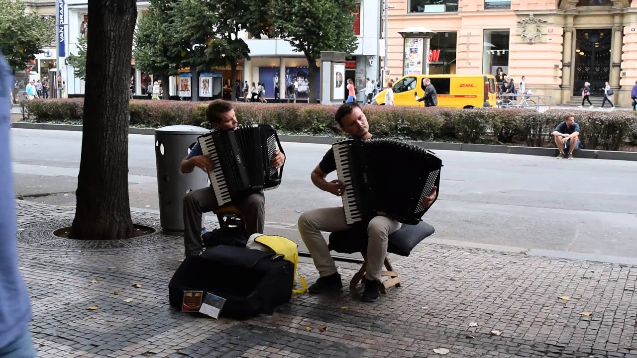 Street musicians in Prague playing accordions YouTube