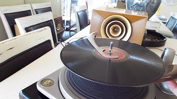 BSR UA-6 automatic 3 speed record changer playing a stack of 45