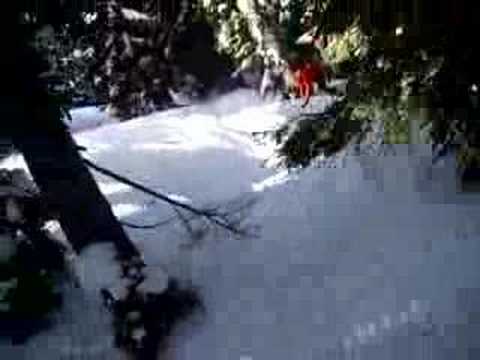 Lauren & I snowboarding the woods