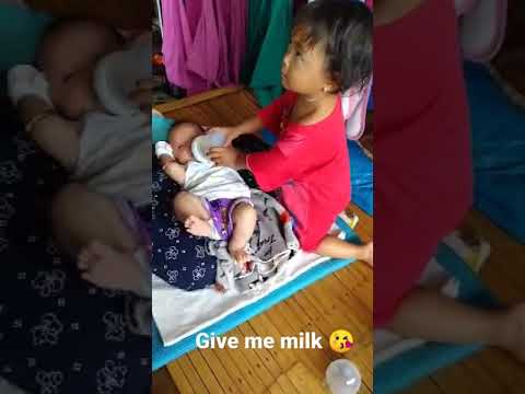 first time she give milk for her baby sister 😘😘 loving caring ate  😘