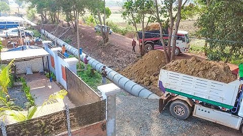 Straight Processing dump truck and bulldozer push soil bury sewer drainage system Next the home