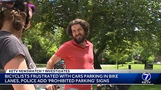 Bicyclists frustrated with cars parking in bike lanes, Omaha police add prohibited parking signs