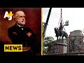 Crowd cheers as robert e lee statue is removed from richmond